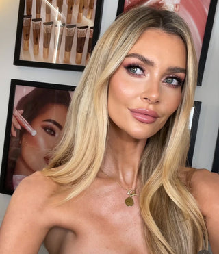 Georgia Trehane wearing gold lunar jewellery