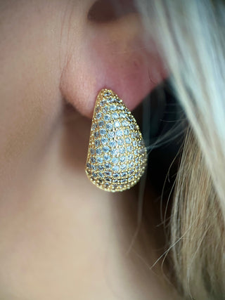 18k gold plated Large Teardrop shape earrings embellished with Cubic Zirconia stones worn on a model with blond hair - Gold Lunar