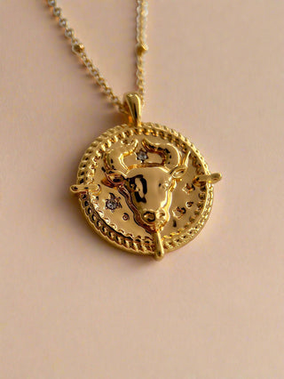 18k gold plated brass Taurus Necklace with cubic zirconia stones and intricate detailing on a coin disc pendant and on fine ball chain - Gold Lunar