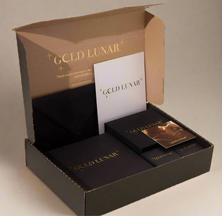 Gold Lunar delivery box with gold font